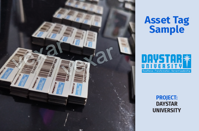 Branded aluminium asset tag riveted to workshop machinery