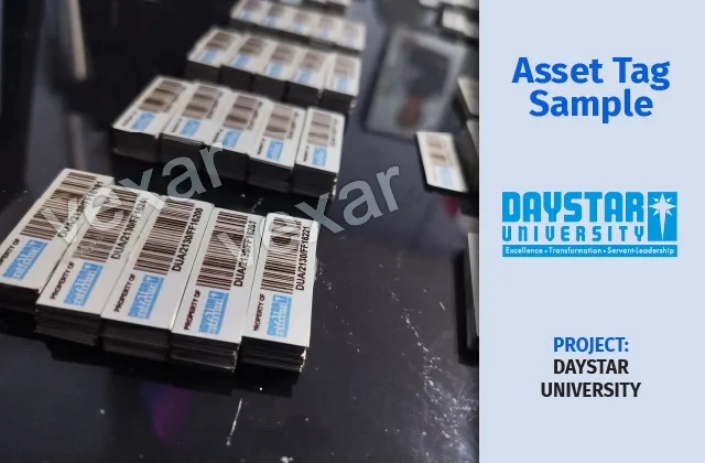 Branded aluminium asset tag sample fixed to plant equipment Branded aluminium asset tag riveted to workshop machinery